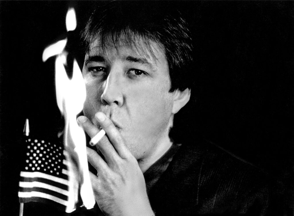 Bill Hicks smoking with US Flag